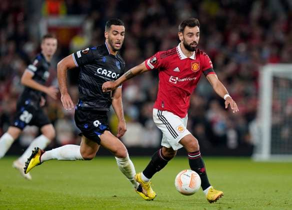 Manchester, England, 8th September 2022. Mikel Merino of Real Sociedad shadows Bruno Fernandes of Manchester United, ManU during the UEFA Europa League match at Old Trafford, Manchester. Picture credit should read: Andrew Yates Sportimage EDITORIAL USE ONLY. No use with unauthorised audio, video, data, fixture lists, club league logos or live services. Online in-match use limited to 120 images, no video emulation. No use in betting, games or single club league player publications. SPI-1856-0087