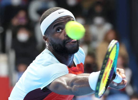 October 6, 2022, Tokyo, Japan - Francis Tiafoe of the United States returns the ball against Bernabe Zapata Miralles of Spain at the second round match of Japan Open tennis tournament at the Ariake Coliseum in Tokyo on Thursday, October 6, 2022. Tiafoe defeated Zapata Mirallesr6-1, 7-6. Noxthirdxpartyxsales  (200498073)