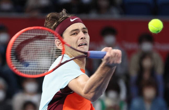 October 8, 2022, Tokyo, Japan - Taylor Fritz of the United States returns the ball against Denis Shapovalov of Canada at the semi final of the Japan Open tennis tournament at the Ariake Coliseum in Tokyo on Saturday, October 8, 2022. Fritz defeated Shapovalov 6-3, 6-7, 6-3. Noxthirdxpartyxsales (0170660536st)