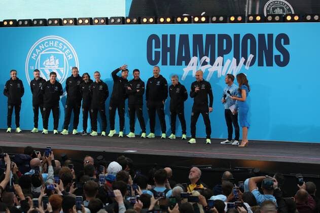 Mandatory Credit: Photo by Paul Greenwood Shutterstock (12952148cb) Manchester City manager Josep Guardiola and backroom staff during the Premier League trophy celebrations in Manchester City centre to celebrate winning the Premier League Manchester City Trophy Parade, Premier League, Football, Manchester, UK - 23 May 2022 EDITORIAL USE ONLY No use with unauthorised audio, video, data, fixture lists, club league logos or live services. Online in-match use limited to 120 images, no video emulation. No use in betting, games or single club league player publications. Manchester City Trophy Parade, Premier League, Football, Manchester, UK - 23 May 2022 EDITORIAL USE ONLY No use with unauthorised audio, video, data, fixture lists, club league logos or live services. Online in-match use limited to 120 images, no video emulation. No use in betting, games or single club league player publications. Copyright: xPaulxGreenwood Shutterstockx 12952148cb