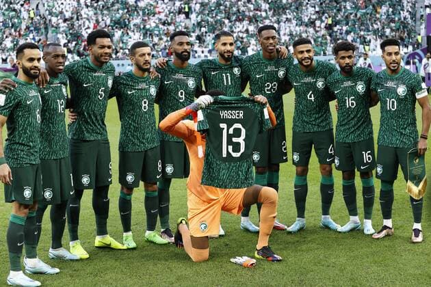 DOHA LR Mohammed Al Burayk of Saudi Arabia, Saud Abdulhamid of Saudi Arabia, Mohammed Al Burayk of Saudi Arabia, Abdulelah Al Malki of Saudi Arabia , Firas Al Buraikan of Saudi Arabia, Saleh Al Shehri of Saudi Arabia, Mohamed Kanno of Saudi Arabia, Abdulelah Al Amri of Saudi Arabia, Sami Al Najei of Saudi Arabia, Salem Al Dawsari of Saudi Arabia show a shirt for Yasir Al Shahrani of Saudi Arabia during the FIFA World Cup Qatar 2022 Group C match between Poland and Saudi Arabia at the Education City Stadium on November 26, 2022 in Doha, Qatar AP Dutch Height MAURICE OF STONE FIFA World Cup Qatar 2022 2022 xVIxANPxSportx xMauricexvanxSteenxWKxIVx 458370884 originalFilename: 458370884.jpg