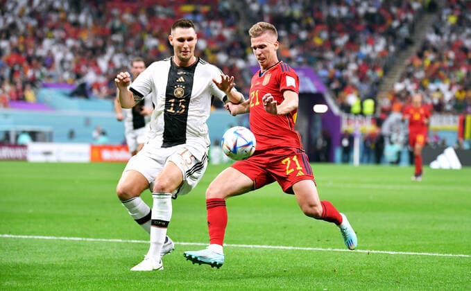 Football, World Cup, 2022, Men, Qatar, Group E, Matchday 2, Al Bayt Stadium Spain Germany 1 1 Dani Olmo SPA , Niklas Süle GER Action FIFA REGULATES PROHIBIT ANY USE OF PHOTOGRAPHS AS IMAGE SEQUENCES AND OR QUASI VIDEO