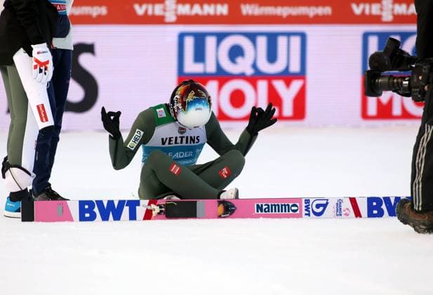 Garmisch Partenkirchen, Germany 01 January 2023 71 international Four Hills Tournament, Ski Jumping, Men, World Cup, Garmisch Partenkirchen, Great Olympic Hill, Olympic Ski Stadium, NEW YEAR SKI JUMPING, Competition The winner sits on the ground in the run-out and bows to the hill, GRANERUD Halvor Egner NOR