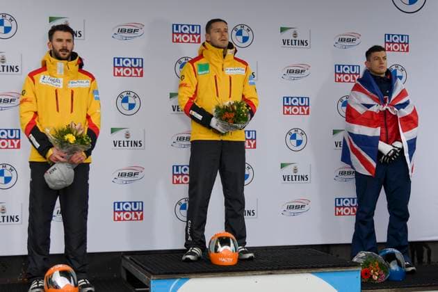 vl JUNGK Axel GER GROTHEER Christopher GER WESTON Matt GBR Award Ceremony 06 01 2023 ¢ Skeleton Men ¢ BMW IBSF World Cup Bob Skeleton in Winterberg, Veltins Arena, NRW Germany Copyright: xpepphotox xHorstxMauelshagenx pep00321, pep_20230106_hm