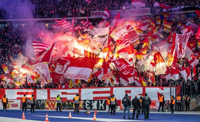 Berlin, 28 01 2023, Football, Bundesliga, 18 Matchday, Hertha BSC 1 FC Union Berlin, Olympiastadion Fans of Union Berlin send Bengal fire DFL regulations and DFB regulations prohibit any use of photographs as image sequences and or quasi video, Foto Andreas Gora Hertha BSC 1 FC Union Berlin
