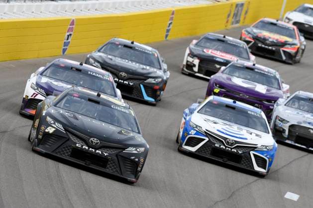 LAS VEGAS, NV - MARCH 05: Ty Gibbs ( 54 Joe Gibbs Racing He Gets us Toyota) races into turn one during the NASCAR, Motorsport, USA Cup Series Pennzoil 400 presented by Jiffy Lube on March 5, 2023, at Las Vegas Motor Speedway in Las Vegas, Nevada. (Photo by Michael Allio Icon Sportswire) AUTO: MAR 05 NASCAR Cup Series Pennzoil 400 presented by Jiffy Lube Icon116230305034