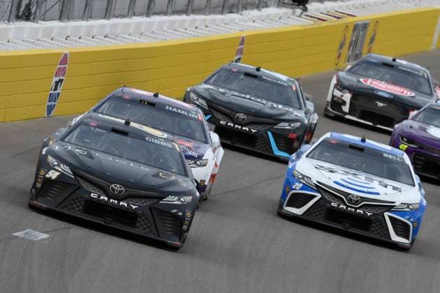 LAS VEGAS, NV - MARCH 05: Ty Gibbs ( 54 Joe Gibbs Racing He Gets us Toyota) races into turn one during the NASCAR, Motorsport, USA Cup Series Pennzoil 400 presented by Jiffy Lube on March 5, 2023, at the Las Vegas Motor Speedway in Las Vegas, Nevada. (Photo by Michael Allio Icon Sportswire) AUTO: MAR 05 NASCAR Cup Series Pennzoil 400 presented by Jiffy Lube Icon116230305064
