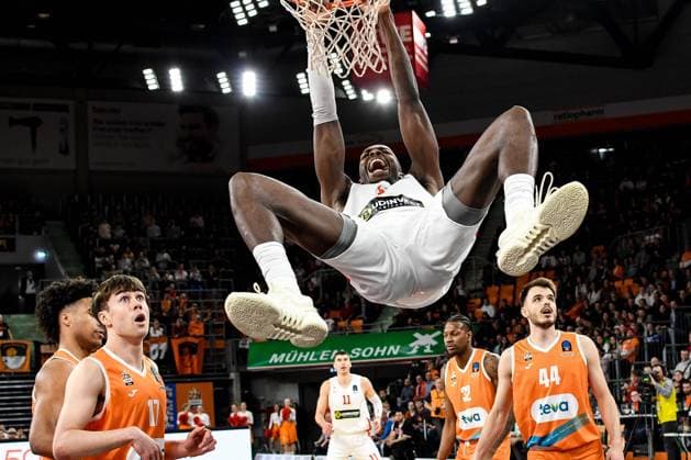 GER, EuroCup, ratiopharm Ulm vs Prometey Slobozhanske 08 03 2023, ratiopharm arena, Neu Ulm, GER, EuroCup, ratiopharm Ulm vs Prometey Slobozhanske, in the picture James Dickey III Slobozhanske, 1 hangs on the basket, Juan Nunez Ulm, 17 , Fedor Zugic Ulm, 44 nordphotoxGmbHx xHafner nph00200