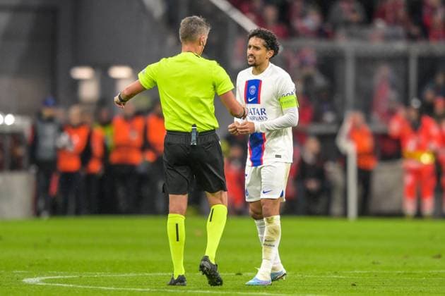 Soccer, UEFA Champions League, Round of 16, 20230308, FC Bayern Munich FC Paris St Germain In the picture referee Daniele ORSATO ITA and MARQUINHOS FC Paris Saint Germain, 5 Munich Allianz Arena Bayern Germany Copyright: Passion2Press MarkusxFischerx