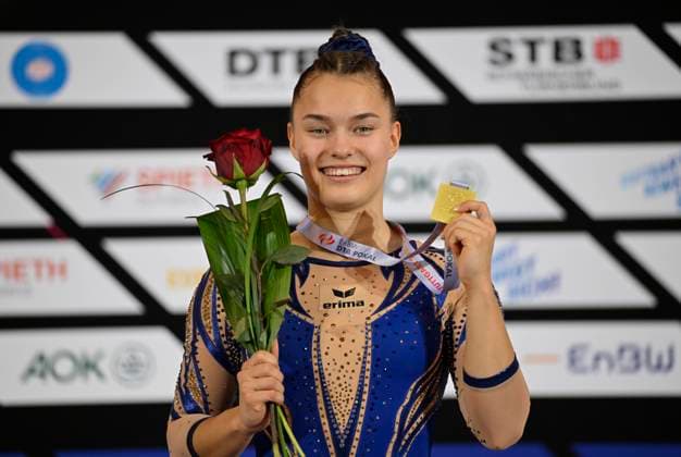 Jessica Schlegel GER wins gold medal on balance beam award ceremony honor joy happiness jubilation shows medal gymnastics 38 EnBW DTB Pokal DTB Pokal Stuttgart Porsche Arena 17 19 03 2023 gymnastics EnBW DTB Pokal