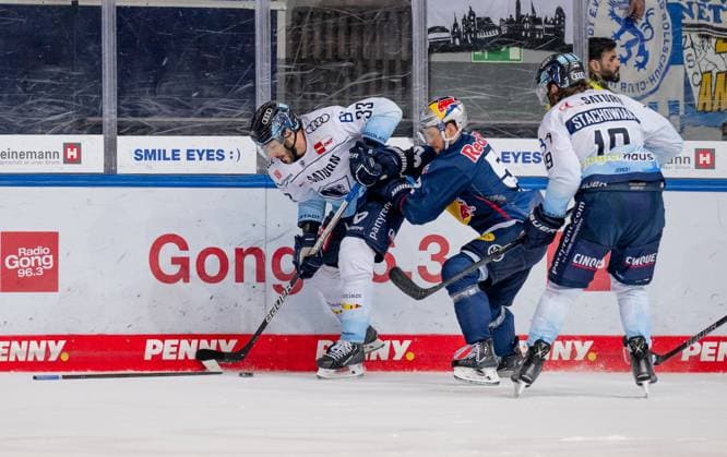 Fight for the puck by Patrick Hager EHC Red Bull Muenchen, 52 with Charles Bertrand ERC Ingolstadt Panther, 33 and Wojciech Stachowiak ERC Ingolstadt Panther, 19 EHC Red Bull Muenchen vs ERC Ingolstadt, ice hockey, DEL, playoffs, final game 1, season 2022 2023, 14 04 2023 EHC Red Bull Muenchen vs ERC Ingolstadt, ice hockey, DEL, playoffs, final game 1, season 2022 2023, 14 04 2023 Muenchen Copyright: xEibner-Pressefoto HeikexFeinerx EP_HFR