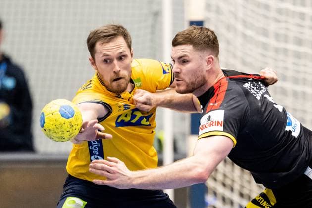 230427 Albin Lagergren of Sweden and Johannes Golla of Germany during the EHF Euro Cup handball match between Sweden and Germany on April 27, 2023 in Kristianstad Photo Petter Arvidson BILDBYRAN code PA PA0560 handball handboll handball ehf euro cup sweden germany bbeng  Copyright: PETTERxARVIDSON BB230427PA102