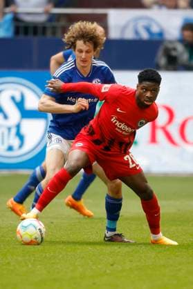 Gelsenkirchen, Germany, 1 Football Bundesliga 33 Matchday FC Schalke 04 vs Eintracht Frankfurt 2 2 on 20 05 2023 at Veltins Arena on Schalke in Gelsenkirchen Alex KRAL S04 left and Eric Junior DINA EBIMBE FFM right