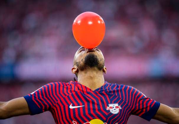 Munic, Germany 20th May, 2023 Goal celebration Christopher Nkunku RBL blows a balloon on FC Bayern Munich RB Leipzig 20 05 2023