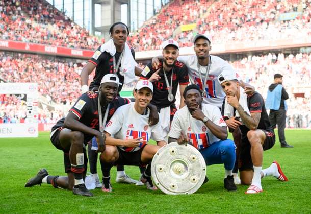 back f l Mathys TEL M , Noussair MAZRAOUI M , Ryan GRAVENBERCH M , front f l Dayot UPAMECANO M , Jamal MUSIALA M , Alphonso DAVIES M , Joao CANCELO M pose with the championship trophy, Soccer 1 Bundesliga, 34 Spieltag, 1 FC Koeln K FC Bayern Muenchen M 1 2, on 27 05 2023 in Koeln Germany DFL regulations prohibit any use of photographs as image sequences and or quasi video Â