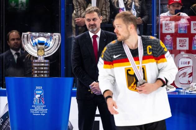 230528 The World Champion trophy and Moritz Müller of Germany during the 2023 IIHF Ice Hockey World Championship final game between Canada and Germany on May 28, 2023 in Tampere Photo Joel Marklund BILDBYRAN kod JM JM0489 bbeng ishockey ice hockey ice hockey vm 2023 ishockey vm vm vm 2023 iihf ice hockey world championship final canada canada germany germany  Copyright: JOELxMARKLUND BB230528JM145