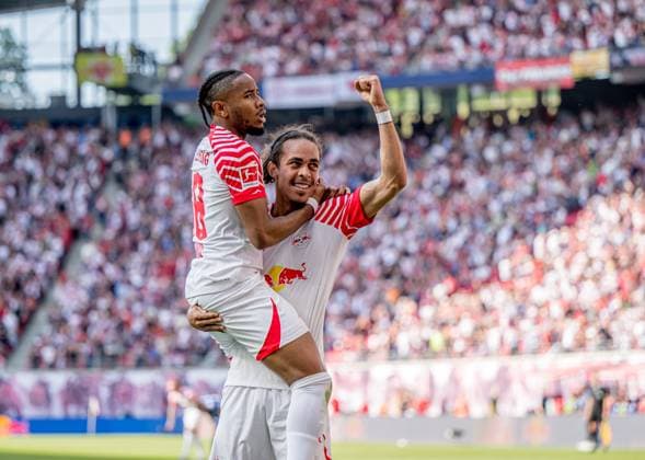Leipzigs Yussuf Poulsen celebrates after scoring the 3 2 with Christopher Nkunku Football 1 Bundesliga, Matchday 34 RB Leipzig FC Schalke 04 4 2 27 May 2023 Leipzig, Red Bull Arena RB Leipzig FC Schalke 04 4 2