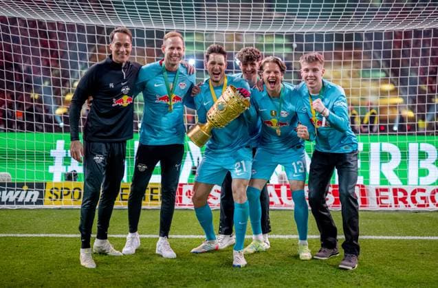 Leipzigs goalkeeper team with goalkeeper Janis Blaswich, goalkeeper coach Frederik Goessling, Peter Gulacsi, Jonas Nickisch, Timo Schlieck and Oerjan Nyland cheer after the match with the cup DFB Pokalfinale 2023 Eintracht Frankfurt RB Leipzig 0 2 3 June 2023 Olympiastadion, Berlin SG Eintracht Frankfurt RB Leipzig 0 2
