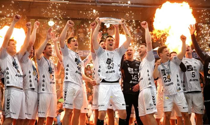 BAU 11 06 2023 Göppingen Handball Frisch Auf Göppingen vs THW Kiel, Kiel celebrates championship, Nikola Bilyk with championship trophy