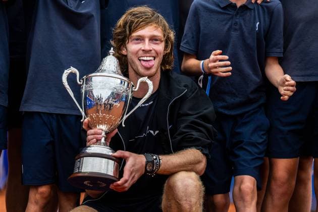 230723 Andrey Rublev, Russia, celebrates with the Mr. G? trophy after the singles final during day 7 of the ATP Nordea Open on July 22, 2023 in Bastad, Sweden.  Copyright: MATHILDAxAHLBERG BB230723MA070