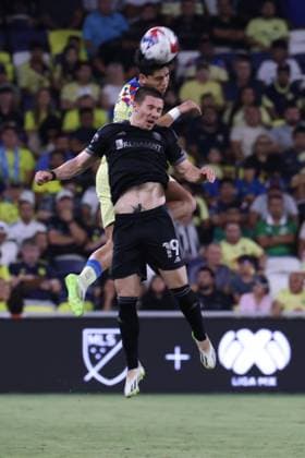 NASHVILLE, TN - AUGUST 08: Nashville SC midfielder Alex Muyl (19) goes up for a header with AmŽrica defender Kevin Alvarez (5) during a LeagueÕs Cup Round of 16 match between Nashville SC and AmŽrica, August 8, 2023 at GEODIS Park in Nashville, Tennessee. (Photo by Matthew Maxey Icon Sportswire) SOCCER: AUG 08 Leagues Cup - Nashville SC vs America EDITORIAL USE ONLY Icon23080814