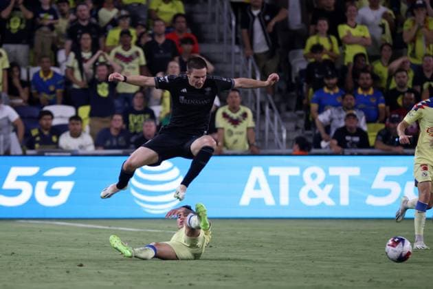 NASHVILLE, TN - AUGUST 08: Nashville SC midfielder Alex Muyl (19) hurdles AmŽrica midfielder Alejandro Zendejas (17) during a LeagueÕs Cup Round of 16 match between Nashville SC and AmŽrica, August 8, 2023 at GEODIS Park in Nashville, Tennessee. (Photo by Matthew Maxey Icon Sportswire) SOCCER: AUG 08 Leagues Cup - Nashville SC vs America EDITORIAL USE ONLY Icon23080820