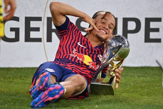 Xavi SIMONS L , award ceremony with cup,cup,trophaee, jubilation,joy,enthusiasm, football DFL Supercup 2023 FC Bayern Muenchen RB Leipzig 0 3 on 12 08 2023 in Munich A L L I A N Z A R E N A