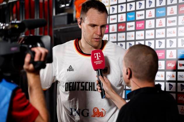 13 08 2023, German Basketball Federation, Supercup 2023, Hamburg, edel optics de Arena, final, Germany Canada, Johannes Voigtmann GER, No7 interviewed by Benni Zander, Magenta Sport Hamburg edel optics de Arena Hamburg Germany