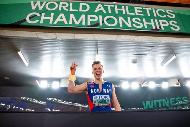 230823 Karsten Warholm of Norway celebrates with his gold medal after winning men s 400 meter hurdles final during day 5 of the 2023 World Athletics Championships on August 23, 2023 in Budapest Photo Vegard Grott BILDBYRAN kod VG JM0521 bbeng friidrott athletics friidrett 2023 world athletics championships world athletics championships budapest23 friidrotts vm friidretts vm vm norge norway jubel  Copyright: VEGARDxGRoTT BB230823VG177