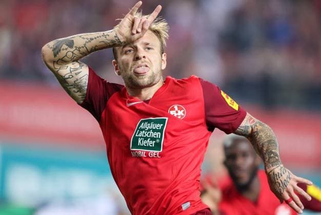 Football 2 BL 1 FC Kaiserslautern 1 FC Nuremberg 02 09 23, devilish cheers after his goal Tymoteusz Puchacz FCK ,