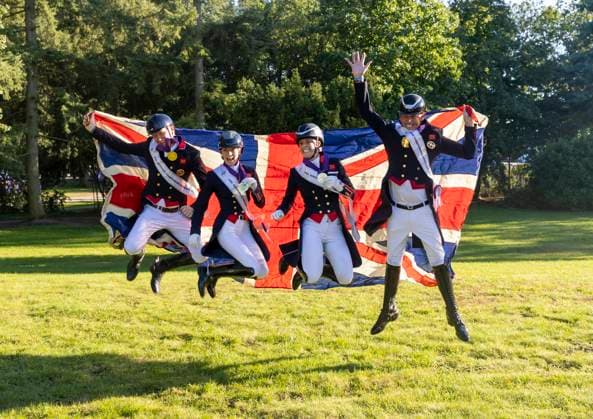 230907 Gareth Hughes, Charlotte Fry, Charlotte Dujardin and Carl Hester of Great Britain with their gold medals after the Team Grand Prix during day 3 of the Equestrian FEI Dressage European Championship on September 7, 2023 in Riesenbeck Photo Roland Thunholm BILDBYRAN kod XZ XZ0128 ridsport equestrian fei dressage european championships day 3 bbeng lagtävling team grand prix dressyr em jubel  Copyright: ROLANDxTHUNHOLM BB230907BB285