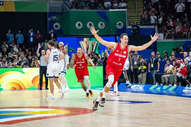 Basketball Manila Pasay 08 09 2023 FIBA Basketball World Cup 2023 Mens World Cup Semifinals United States of America USA Germany GER Germany wins and is in the final Johannes Voigtmann Germany, No 07 Daniel Theis Germany, No 10 cheering