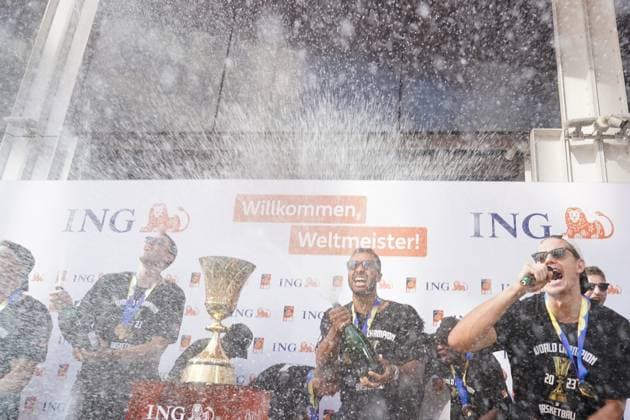 World champion team celebrates winning the title with champagne on stage 11 09 2023 Reception of the world champion team of basketball players in Frankfurt