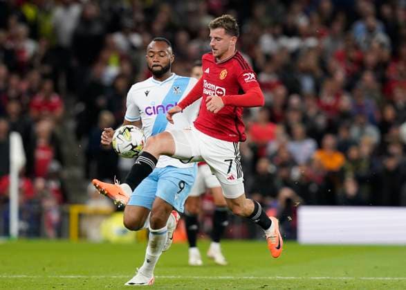 MANCHESTER, ENGLAND, 26th September 2023. Mason Mount of Manchester United, ManU gets in front of Jordan Ayew of Crystal Palace during the Carabao Cup match at OLD TRAFFORD, MANCHESTER. Picture credit should read: Andrew Yates Sportimage EDITORIAL USE ONLY. No use with unauthorised audio, video, data, fixture lists, club league logos or live services. Online in-match use limited to 120 images, no video emulation. No use in betting, games or single club league player publications. SPI-2605-0052