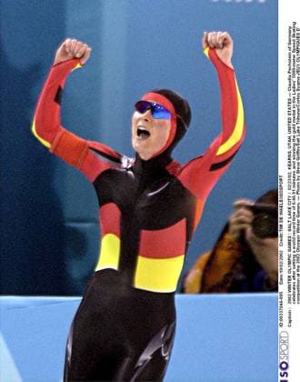 2002 WINTER Olympic Games, Olympische Spiele, Olympia, OS : 2002 WINTER OLYMPIC GAMES : SALT LAKE CITY 02 23 02, KEARNS, UTAH, UNITED STATES --- Claudia Pechstein of Germany celebrates after setting a world record time of 6:46.91 minutes and winning the gold medal in the Ladies 5000-meter Speed skating, Eisschnelllauf competition at the 2002 Olympic Winter games, Winterspiele,Spiele, Summer games --- Photo by Steve Griffin Salt Lake Tribune Corbis Sygma JEUX OLYMPIQUES D HIVER OLYMPISCHE SPELEN www.iso be Ogden United States ETATS UNIS VERENIGDE STATEN Copyright: xTIMxDExWAELEx 56602