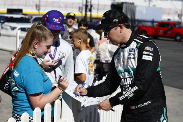 LAS VEGAS, NV - OCTOBER 14: Brad Keselowski ( 6 RFK Racing BuildSubmarines.com Ford) signs autographs during qualifying for the South Point 400 NASCAR, Motorsport, USA Cup Series Playoff race on October 14, 2023, at Las Vegas Motor Speedway in Las Vegas, NV. (Photo by Jeff Speer LVMS Icon Sportswire) AUTO: OCT 14 NASCAR Cup Series Playoff South Point 400 EDITORIAL USE ONLY Icon231014013