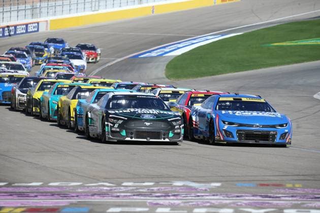 LAS VEGAS, NV - OCTOBER 15: Brad Keselowski ( 6 RFK Racing BuildSubmarines.com Ford) and Kyle Larson ( 5 Hendrick Motorsports HendrickCars.com Chevrolet) lead on a restart during the South Point 400 NASCAR, Motorsport, USA Cup Series Playoff race on October 15, 2023, Las Vegas Motor Speedway in Las Vegas, NV. (Photo by Matthew Bolt LVMS Icon Sportswire) AUTO: OCT 15 NASCAR Cup Series Playoff South Point 400 EDITORIAL USE ONLY Icon231015167