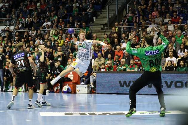 Jonathan Edvardsson TSV Hannover Burgdorf,26 against goalkeeper Nikola Portner SC Magdeburg,80 Handball Bundesliga Season 2023 2024 SC Magdeburg vs TSV Hannover Burgdorf at GETEC Arena in Magdeburg Action,Handball,Germany,15 10 2023