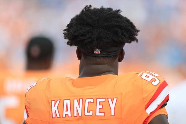 TAMPA, FL - OCTOBER 15: Tampa Bay Buccaneers Defensive End Calijah Kancey (94) listens to the playing of the National Anthem moments before the regular season game between the Detroit Lions and the Tampa Bay Buccaneers on October 15, 2023 at Raymond James Stadium in Tampa, Florida. (Photo by Cliff Welch Icon Sportswire) NFL, American Football Herren, USA OCT 15 Lions at Buccaneers EDITORIAL USE ONLY Icon357231015162