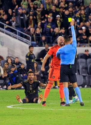 December 2, 2023, Los Angeles, California, USA: Hector Herrera 16 of the Houston Dynamo disputes with the referee a foul call on Timothy Tillman 11 of the Los Angeles Football Club during their Western Conference Final of the Audi 2023 MLS, Fussball Herren, USA Cup Playoffs held on Saturday December 2, 2023 at the BMO Stadium in Los Angeles, California. Los Angeles Football Club defeats Houston Dynamo, 2-0 to win the Western Conference Final. JAVIER ROJAS PI Los Angeles USA - ZUMAp124 20231202_zaa_p124_097 Copyright: xJavierxRojasx