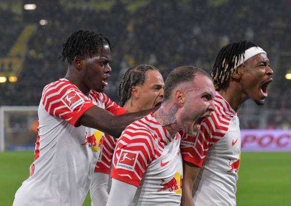 09 12 2023, xblx, Fussball 1 Bundesliga, Borussia Dortmund RB Leipzig emspor, v l 09 12 2023, xblx, Fussball 1 Bundesliga, Borussia Dortmund RB Leipzig emspor, v l celebrate the goal, Torjubel , Jubel, jubeln, jubelt, , Goal scored, Tor zum 0 1, Ramy Bensebaini Borussia Dortmund , own goal, Castello Lukeba RB Leipzig , Xavi Simons RB Leipzig , David Raum RB Leipzig , Mohamed Simakan RB Leipzig DFL DFB REGULATIONS PROHIBIT ANY USE OF PHOTOGRAPHS as IMAGE SEQUENCES and or QUASI VIDEO Dortmund