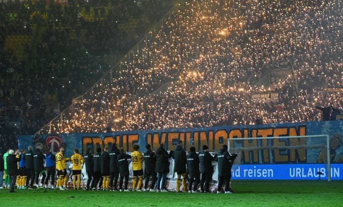 the Dresden team and their fans in the K Block wish each other a Merry Christmas, 10 12 2023, Football, GER, Season 2023 2024, 3 Liga, Dritte Liga, 18 Matchday, Rudolf Harbig Stadion Dresden, SG Dynamo Dresden SpVgg Unterhaching, DFB AND DFL REGULATIONS PROHIBIT ANY USE OF PHOTOGRAPHS as IMAGE SEQUENCES and or QUASI VIDEO,