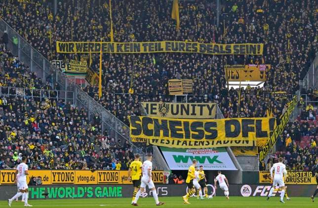 16 12 2023, Soccer 1 Bundesliga 2023 2024, 15 Matchday, FC Augsburg Borussia Dortmund, in the WWK Arena Augsburg, we will not be part of your deal Scheiss DFL, thats what the Dortmund fans think DFL and DFB regulations prohibit any use of photographs as image sequences and or quasi video