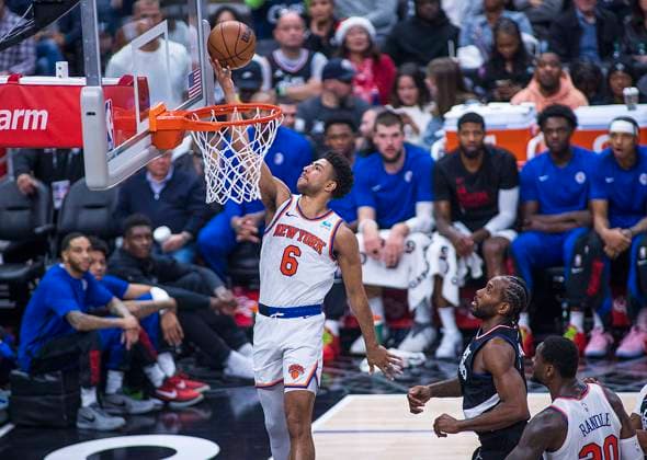 December 16, 2023, Los Angeles, California, USA: Quentin Grimes 6 of the New York Knicks makes a two point shot during their NBA, Basketball Herren, USA game against the Los Angeles Clippers on Saturday December 16, 2023 at Crypto.com Arena in Los Angeles, California. Clippers defeat Knicks, 144-122. ARIANA RUIZ PI Los Angeles USA - ZUMAp124 20231216_zaa_p124_037 Copyright: xArianaxRuizx