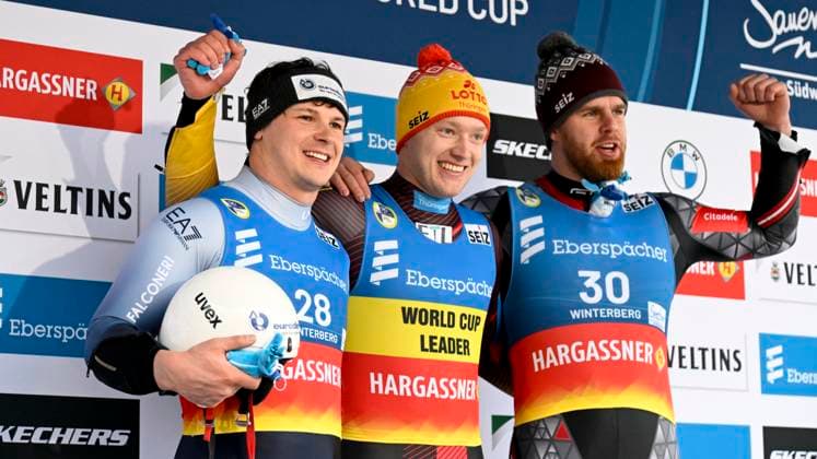 Award ceremony, Dominik Fischnaller ITA 2nd place Max Langenhan GER 1st place Kristers Aparjods, 83rd place LAT 07 01 2024 EBERSPÄCHER Luge World Cup in Winterberg, Mens Single , Veltins Arena, Winterberg, NRW Germany Copyright: xpepphotox xPeterxEppingerx pep00321, pep_20240107_hm