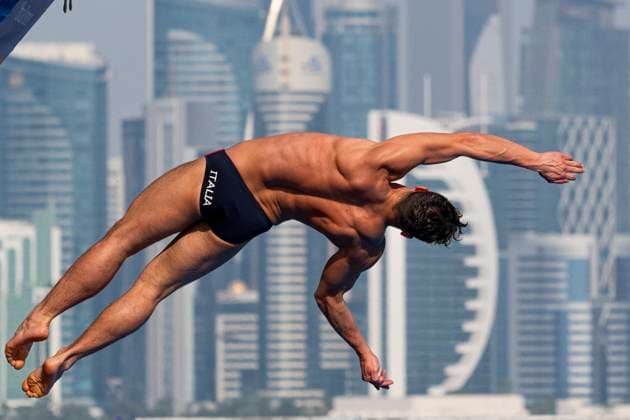 Davide Baraldi of Italy competes in the high diving 27m Platform Men Round 3 - 4 during the 21st World Aquatics Championships at the Old Doha Port in Doha (Qatar), February 15, 2024. GiorgioXPerottino