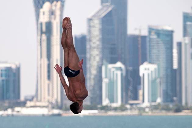 Davide Baraldi of Italy competes in the high diving 27m Platform Men Round 3 - 4 during the 21st World Aquatics Championships at the Old Doha Port in Doha (Qatar), February 15, 2024. GiorgioXPerottino