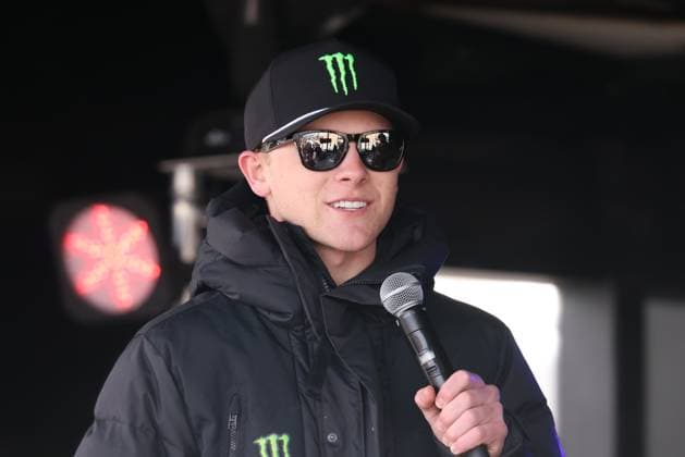 LAS VEGAS, NV - MARCH 05: Ty Gibbs ( 54 Joe Gibbs Racing He Gets us Toyota) speaks at a driver appearance before the NASCAR, Motorsport, USA Cup Series Pennzoil 400 presented by Jiffy Lube on March 5, 2023, at Las Vegas Motor Speedway in Las Vegas, NV. (Photo by Marc Sanchez Icon Sportswire) AUTO: MAR 05 NASCAR Cup Series Pennzoil 400 presented by Jiffy Lube EDITORIAL USE ONLY Icon144230305208400