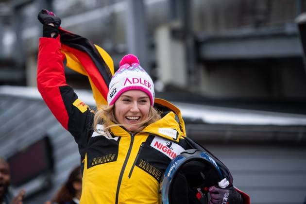 Laura Nolte Germany becomes world champion and celebrates victory and title defense on the podium at the Flower Ceremony, GER, IBSF BMW Bobsleigh World Championship Winterberg, Final Monobob Women, 25 02 2024 GER, IBSF BMW Bobsleigh World Championship Winterberg, Final Monobob Women, 25 02 2024 Winterberg Copyright: xEibner-Pressefoto Memmlerx EP_MMR