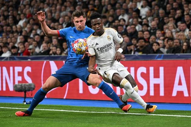 Madrid, Estadio Santiago Bernabeu, 06 03 24, GER, Men, UEFA Champions League, Season 2023 2024, Round of 16, Real Madrid CF RB Leipzig Picture from left in duel Willi ORBAN Leipzig and VINICIUS JUNIOR Real Madrid Only for editorial use UEFA regulations prohibit any use of photographs as image sequences and or quasi video Spain